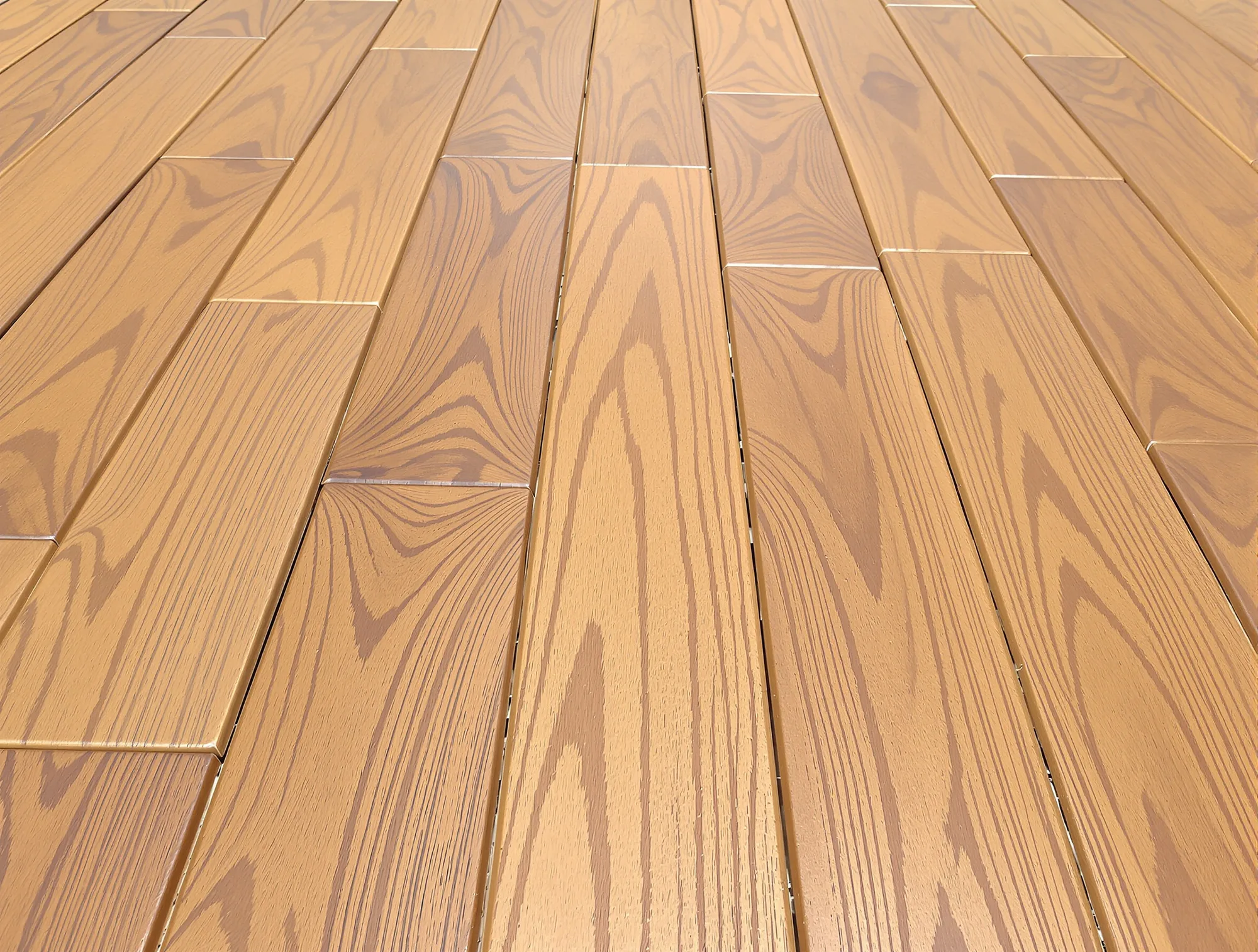 Deck boards with a warm brown semi-transparent stain and visible grain